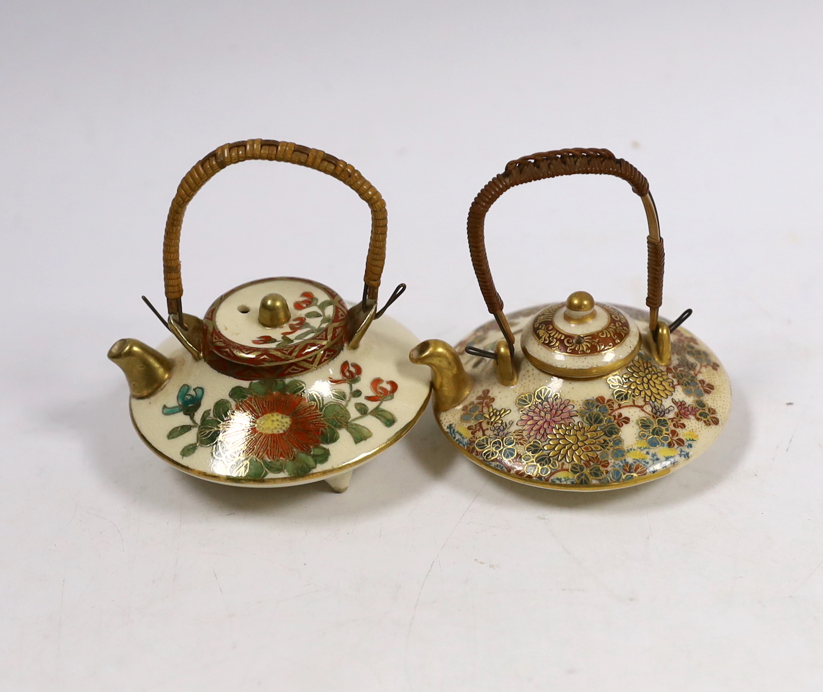 Two Japanese Satsuma pottery miniature teapots, early 20th century, largest 7cm wide